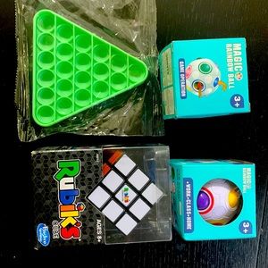 One pop it one Rubik’s cube two magic rainball fidgets